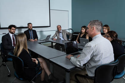 Faculty and graduate students at forum